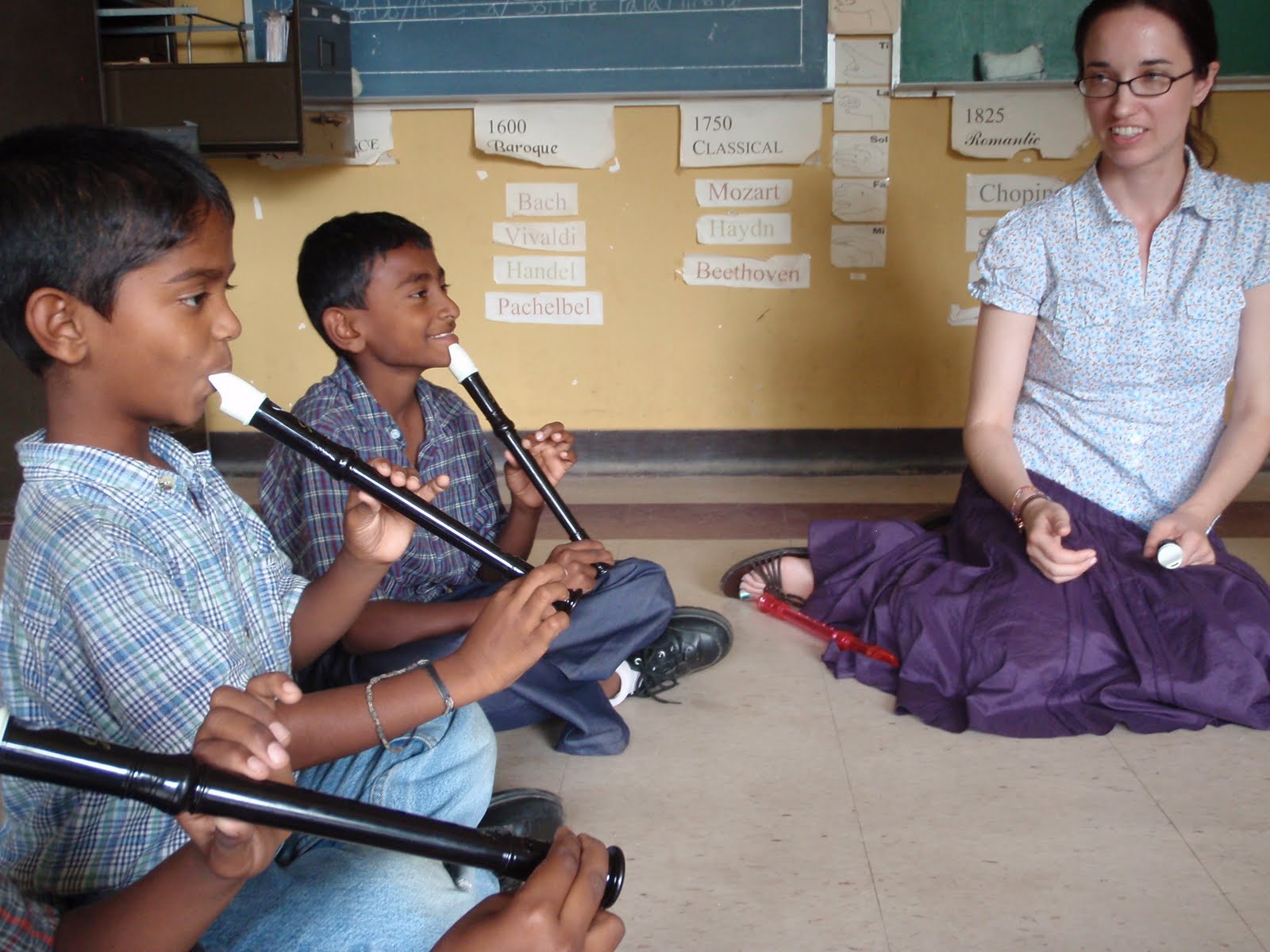 4th graders Dinesh, Praveen, and Shree Shakti in recorder class with