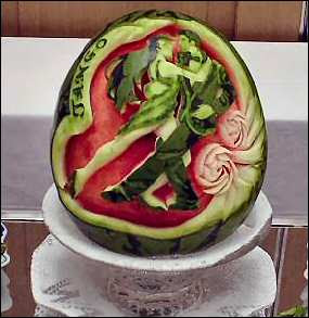 Watermelon carving art - seen at curiousphotos.blogspot.com