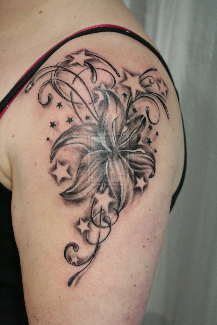 http://3.bp.blogspot.com/_IjuwyxUXTWA/TFaKgyejFoI/AAAAAAAAAIs/t8Wc1SKHPBc/s1600/Flower_Stars_Tribal_Tattoo_by_2Face_Tattoo.jpg