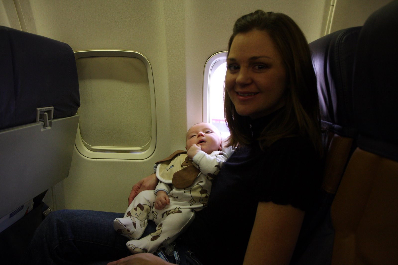 [Mommy+and+Logan+on+airplane.JPG]