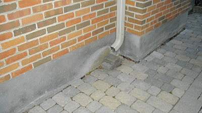 downpipe placement downspout toronto eavestroughing points key walkways water