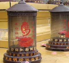 closeup of votive lamps