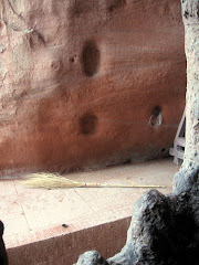 eroded holes in cliff faces