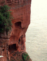 view of cliffs on left side of Buddha, taken on way down right side