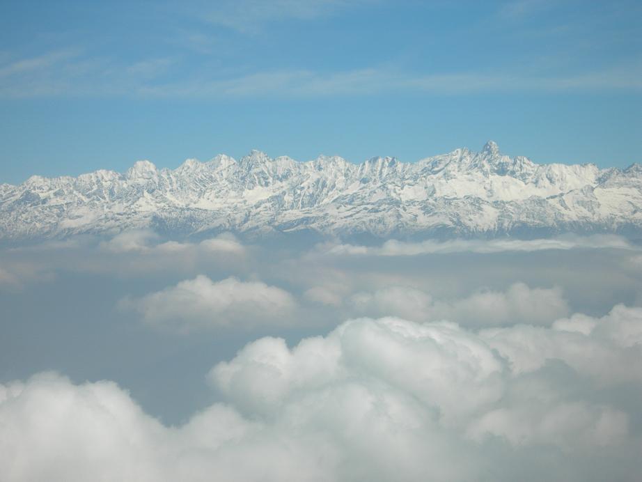 [mountain+views+from+the+plane.JPG]