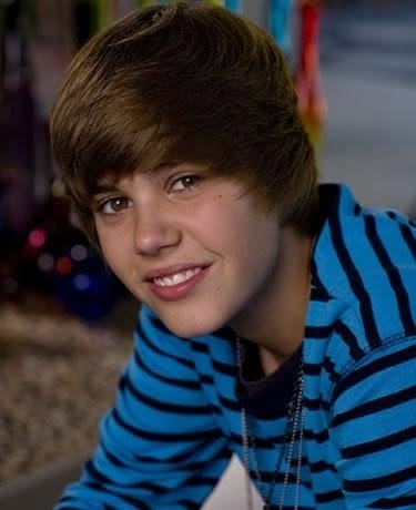 Justin Bieber's eyes are light brown. Justin Bieber is 3 and a half inches, 