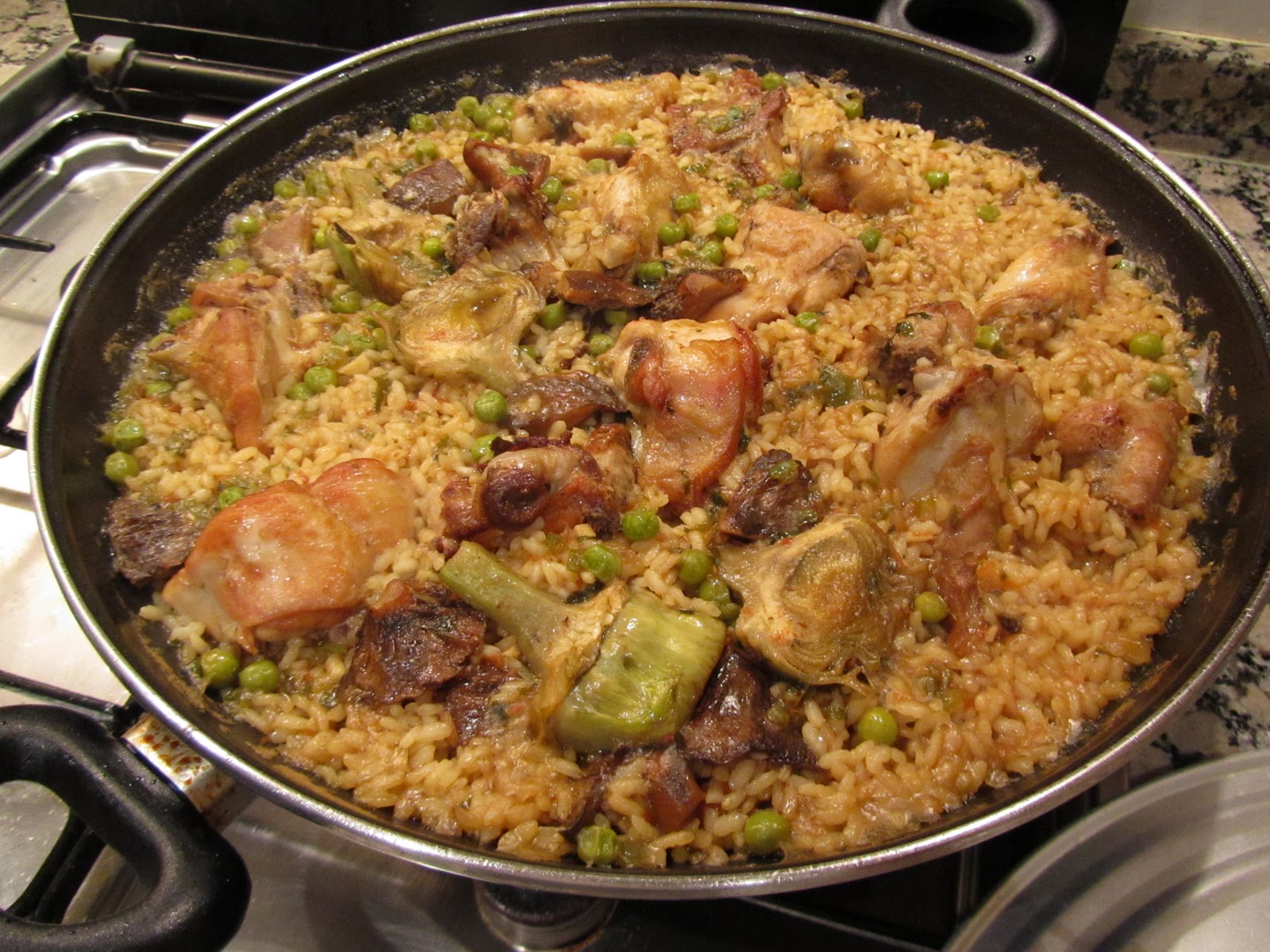 Les receptes del Miquel Paella de arroz con conejo y pollo