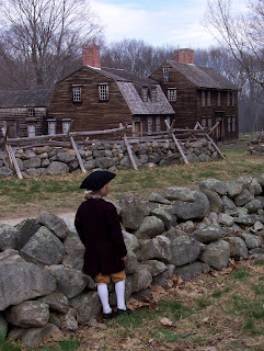 Boy wearing tricornered hat at Lexington and Concord reenactment