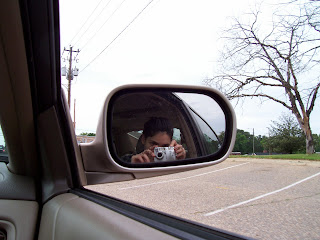 Objects in mirror are closer than they appear, self portrait
