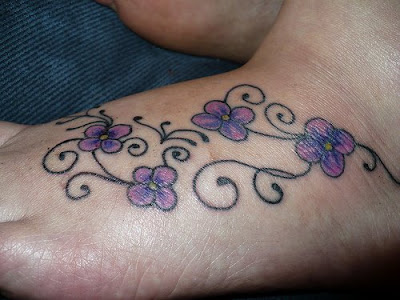 pictures of foot tattoos. makeup Flower vine foot tattoo