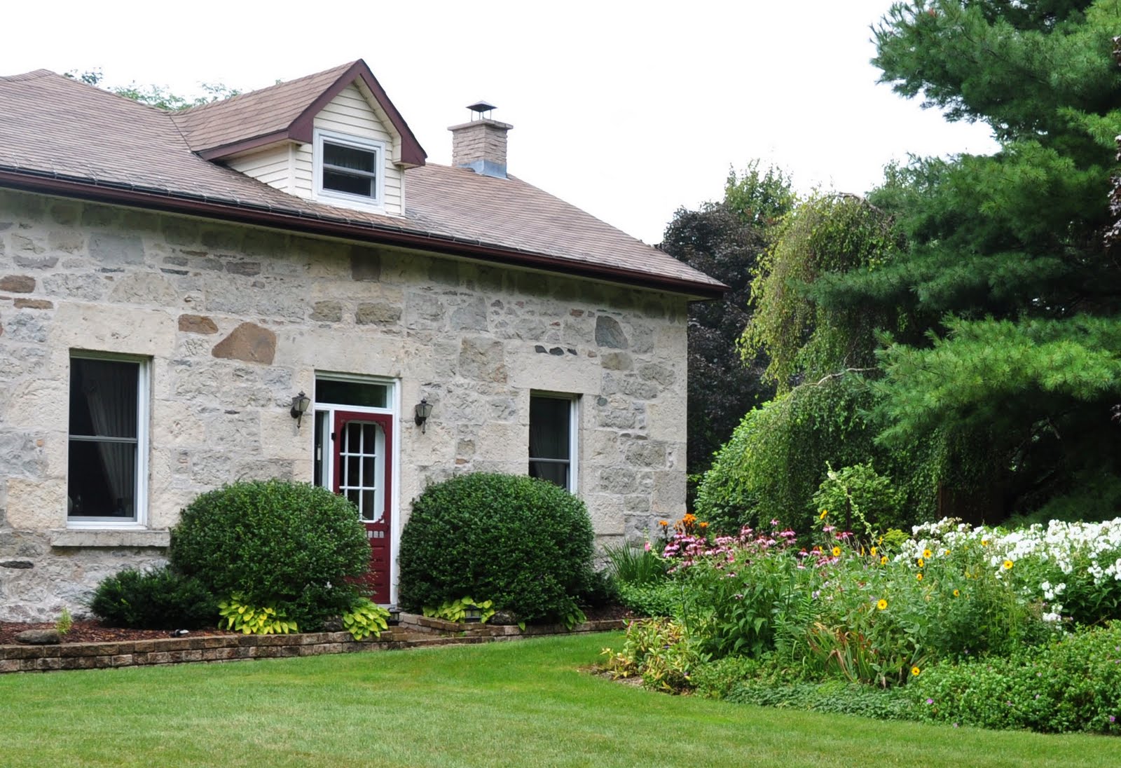 Three Dogs in a Garden Great Fall Color in a Country Garden in Eramosa