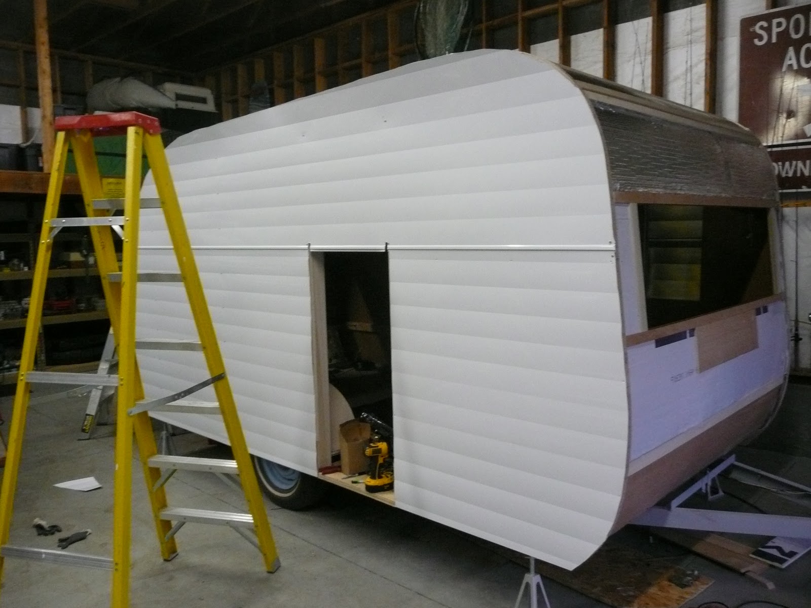 1958 Westerner Travel Trailer The new siding is on!!!