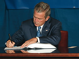 [bush_signing.jpg]