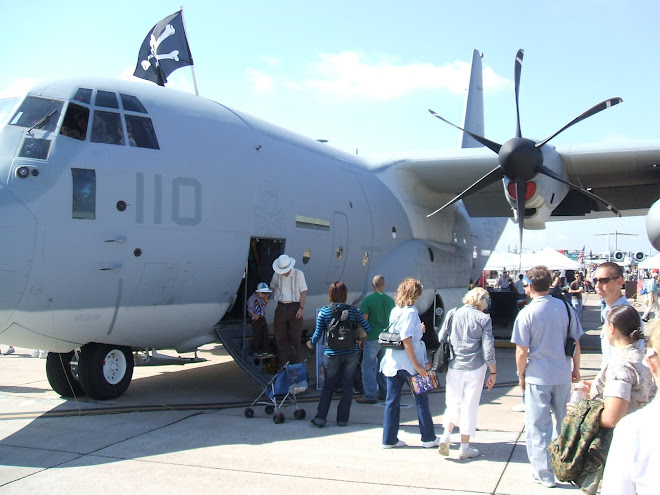 front of a C-130 miramar