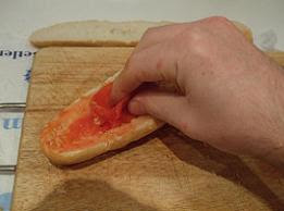 Rubbing the tomato into the bread requires technique