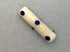 Ivory with blue dots