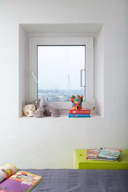 COLORIDO DEPARTAMENTO DE 21M2 TAMKA APARTMENT BY JAKUB SZCZESNY