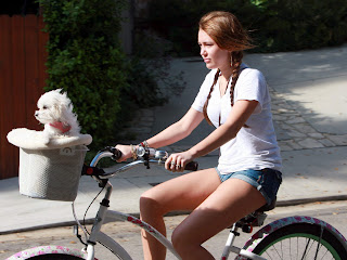 Miley Cyrus Bike .. Miley+Cyrus+-+riding+her+bike001