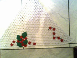 tapete triangular com flores