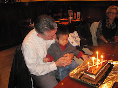 Alexandre blowing the candles for his Dad's B-day