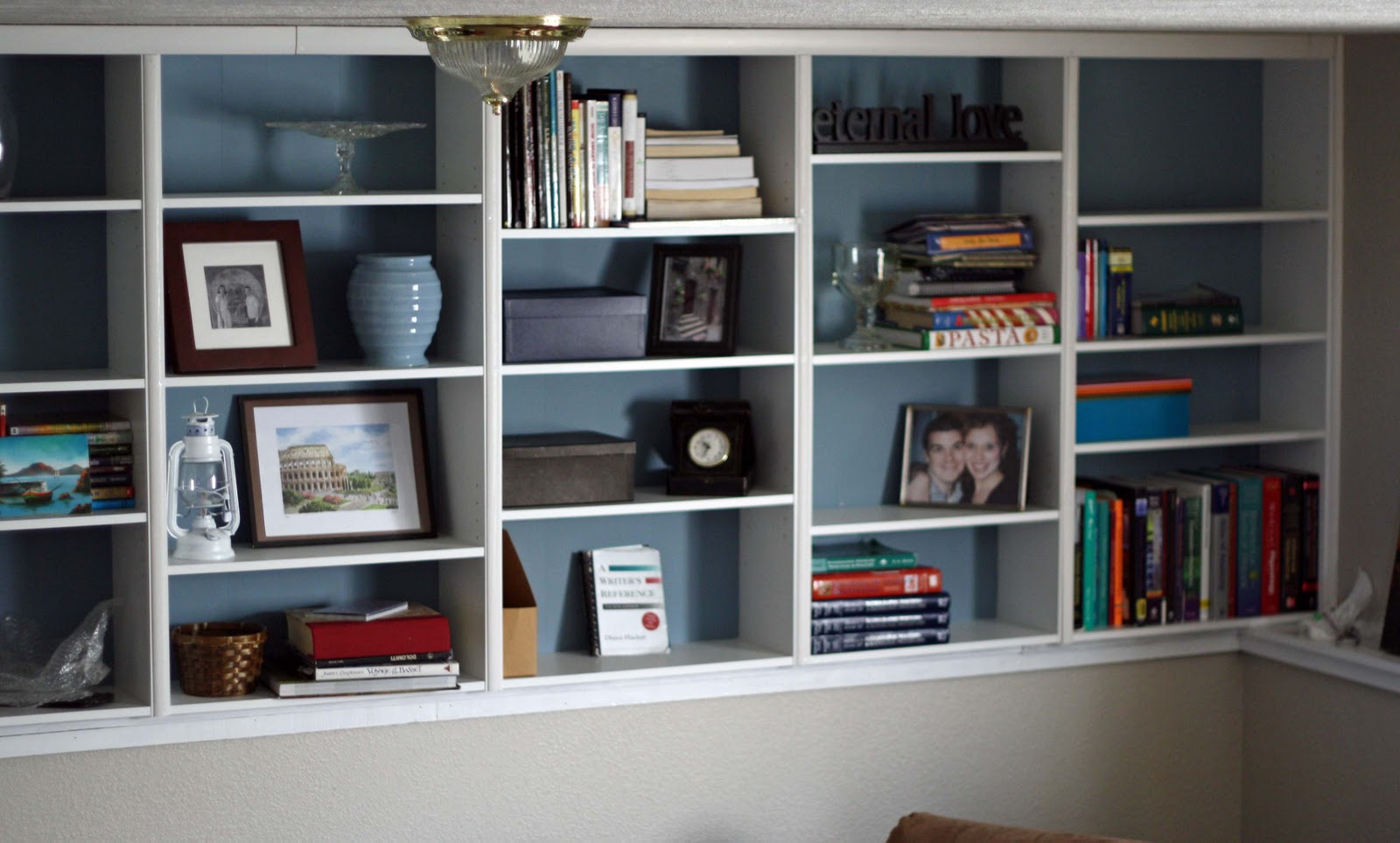 Running With Scissors Painting Backing of Shelves