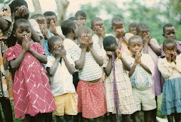 Orphans praying for sponsors to pay school fees at Adventist schools in Uganda, East Africa.
