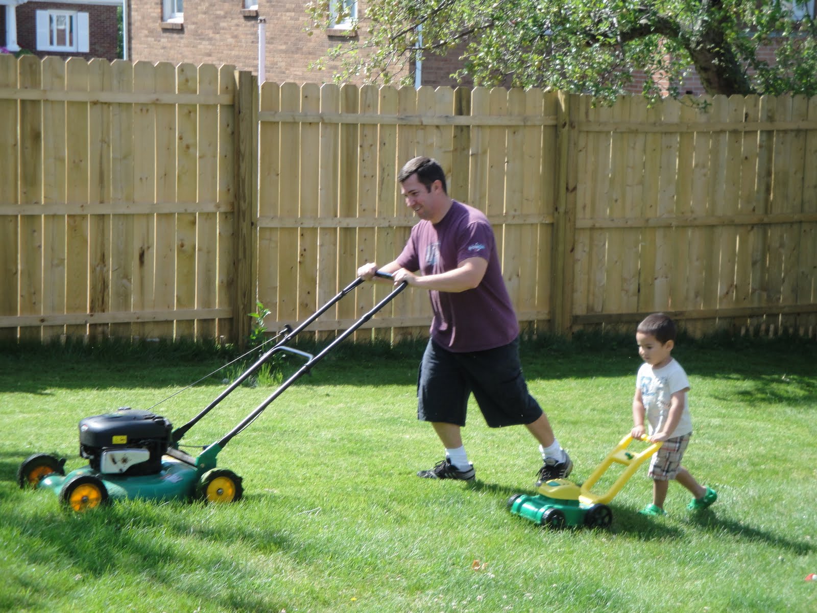 Travels and Wandering Father &amp; Son Mowing the Grass
