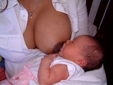 Women+breastfeeding+to+animals