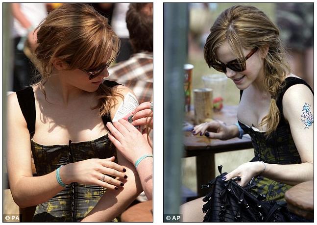 Rock chick: Emma Watson has a temporary tattoo applied to her arm backstage 