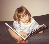 Erin, age 4, reading from an Eyewitness book