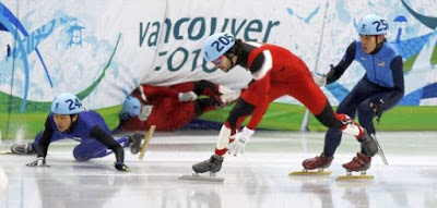 Vancouver+Olympics+26Feb10+SOUTH+KOREA+Sung+Si-bak+CANADA+Francois-Louis+Tremblay+%26+Charles+Hamelin+gold+US+Apolo+Ohno+500m+short+track+speed+skate-by+Reuters.jpg