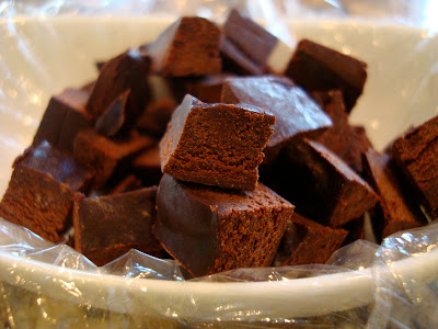 Diced up Raw Vegan Coconut Oil Chocolate in white bowl 