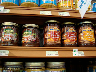 Close up of a few brands of nut butters