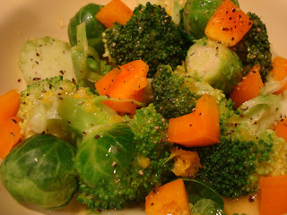 Mixed vegetables tossed in dressing in bowl