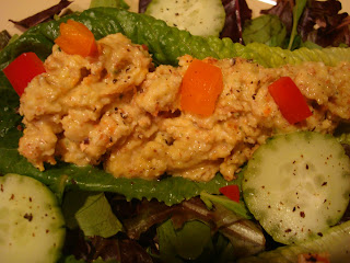 Sweet and tangy chickenless chicken salad over mixed vegetables and green salad