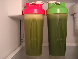 Green Juices in Blender Bottles in refrigerator