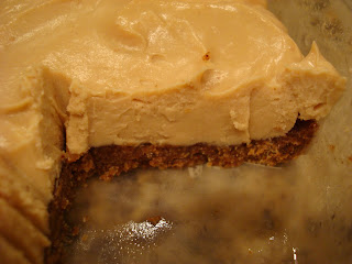 Raw Vegan Cheesecake in container with slice removed