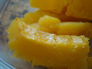 Close up of acorn squash fries in clear container
