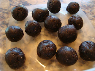 Raw Vegan Dark Chocolate Cherry Balls in clear container