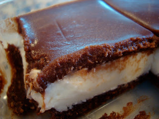 Up close of one Creme de Menthe Bar in clear container