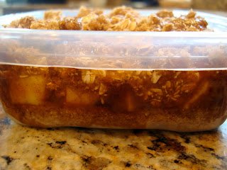 Side view of layers of Raw Vegan Apple Crumble in container