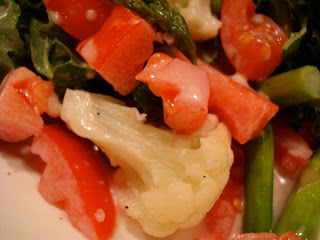 Mixed vegetables on top of salad