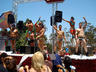 Men on stage at Gay Pride Parade