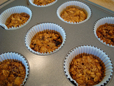 Close up of muffins in liners in muffin tin