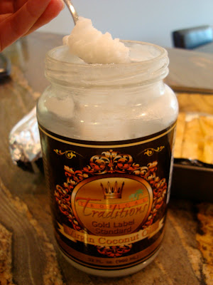 Jar of coconut oil with spoon