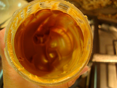 Inside jar of peanut butter