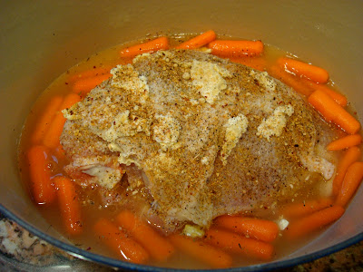 Turkey in dutch oven with carrots and broth