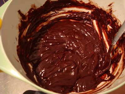 Melted chocolate being stirred