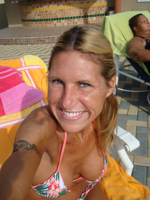 Woman in bathing suit on lounge chair