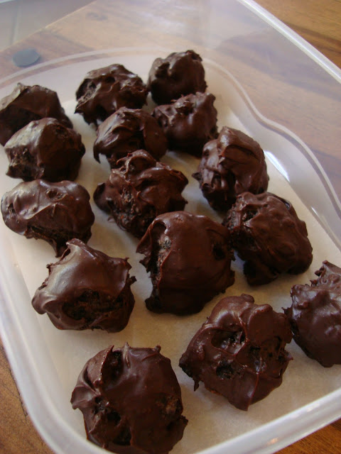 Chocolate Covered Oreo Balls in clear container